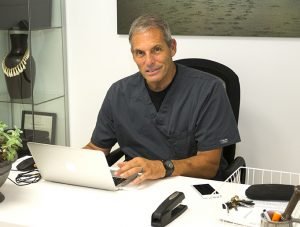 Dr. Bradford Staph at his desk